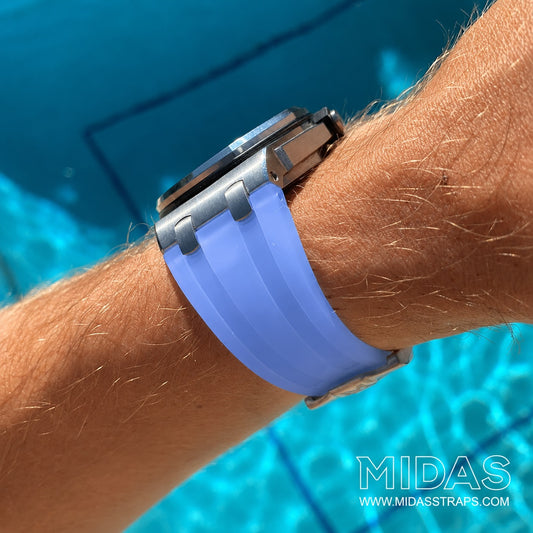 Audemars Piguet Royal Oak Offshore 15710ST 42mm ice blue clear rubber strap worn on wrist poolside
