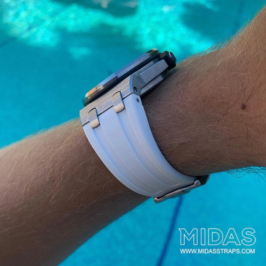 AP Royal Oak Offshore 42mm white rubber replacement strap worn on wrist poolside MIDAS