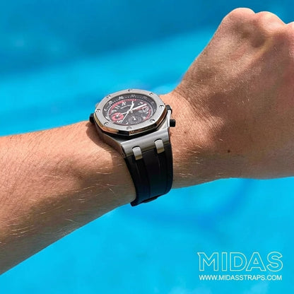 AP Royal Oak Offshore 42mm black rubber replacement strap worn on wrist poolside MIDAS