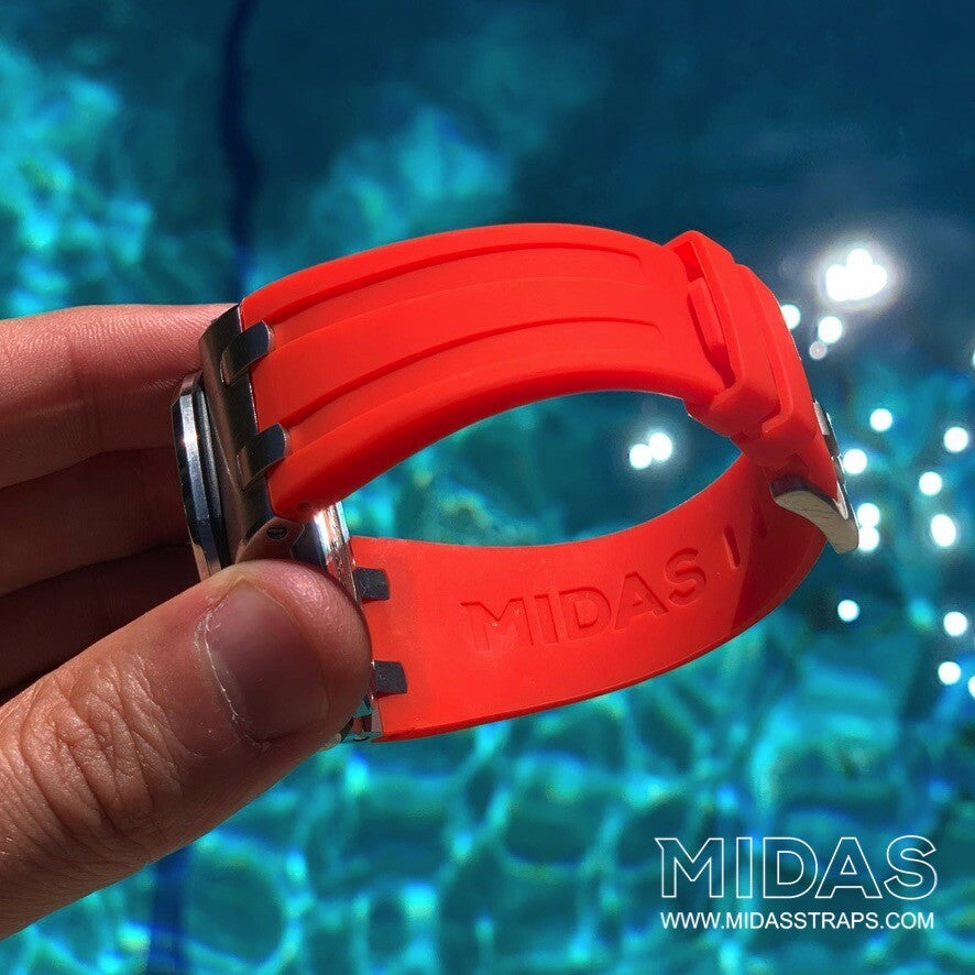 AP Royal Oak Offshore 42mm red rubber replacement strap worn on wrist poolside MIDAS