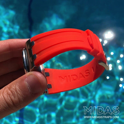 AP Royal Oak Offshore 42mm red rubber replacement strap worn on wrist poolside MIDAS