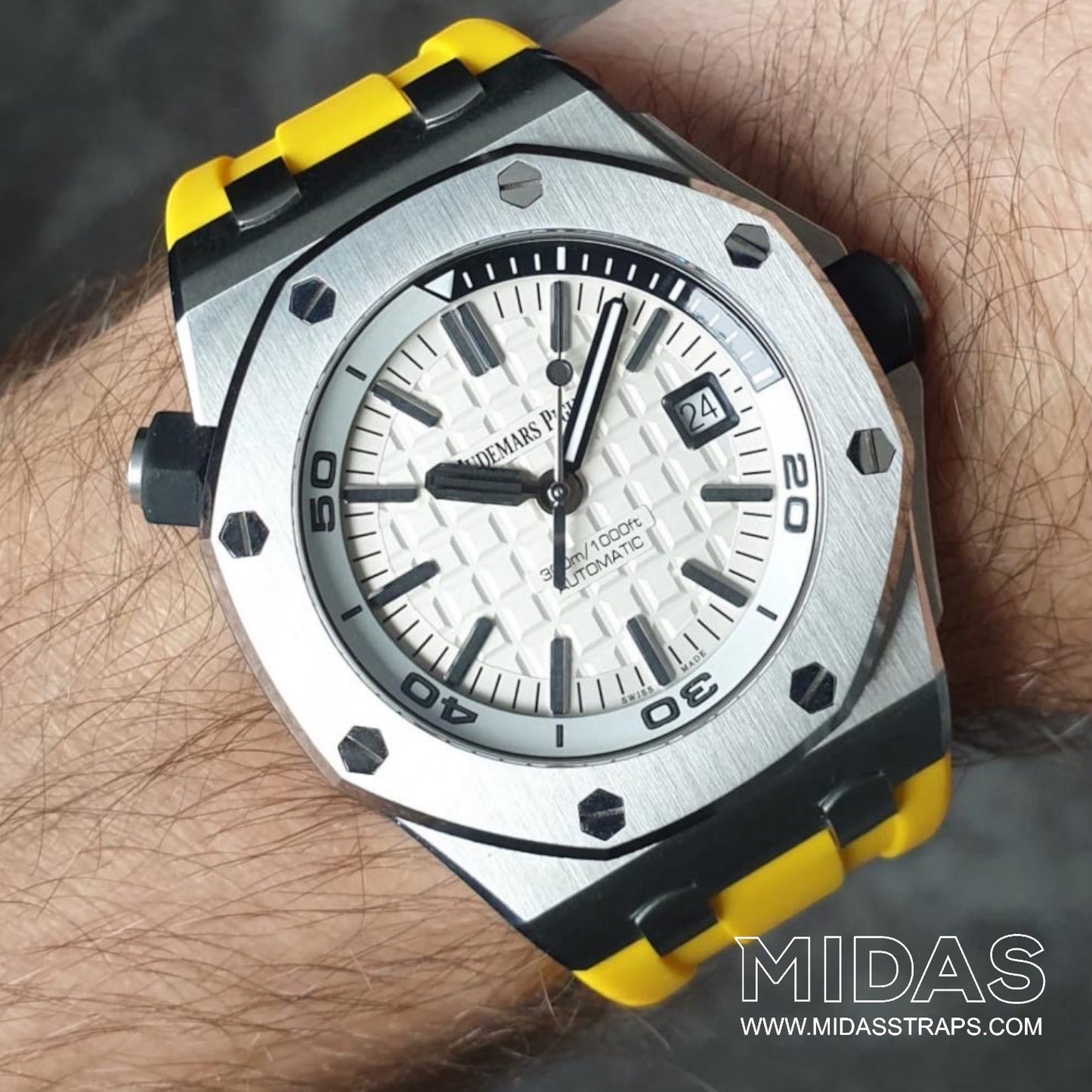 AP Royal Oak Offshore 42mm yellow rubber replacement strap worn on wrist poolside MIDAS