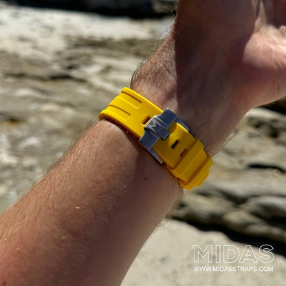 AP Royal Oak Offshore 42mm yellow rubber replacement strap worn on wrist poolside MIDAS