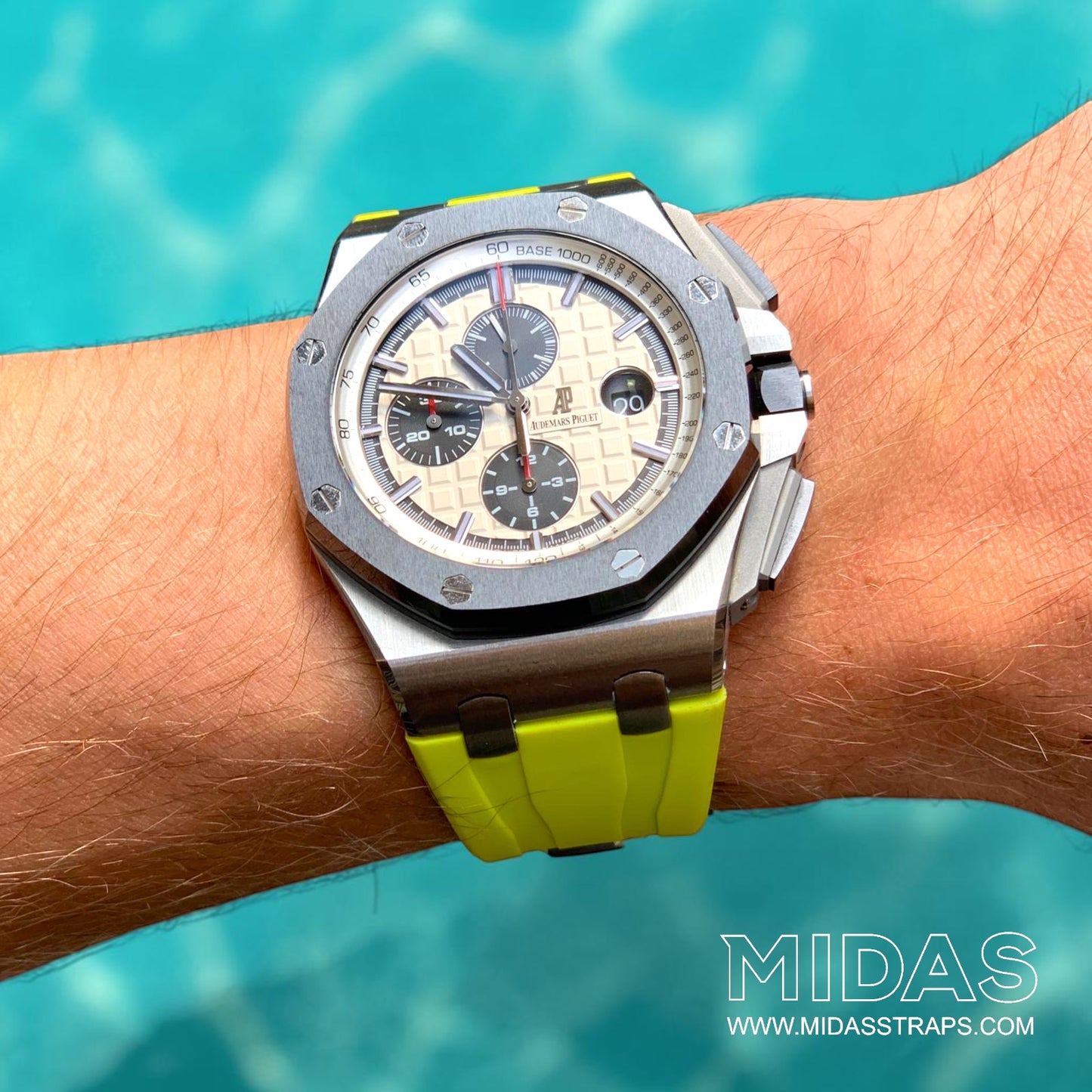 Acid lime green replacement rubber strap fitted to an AP Royal Oak Offshore 26400 in an outdoor lifestyle wrist photograph.