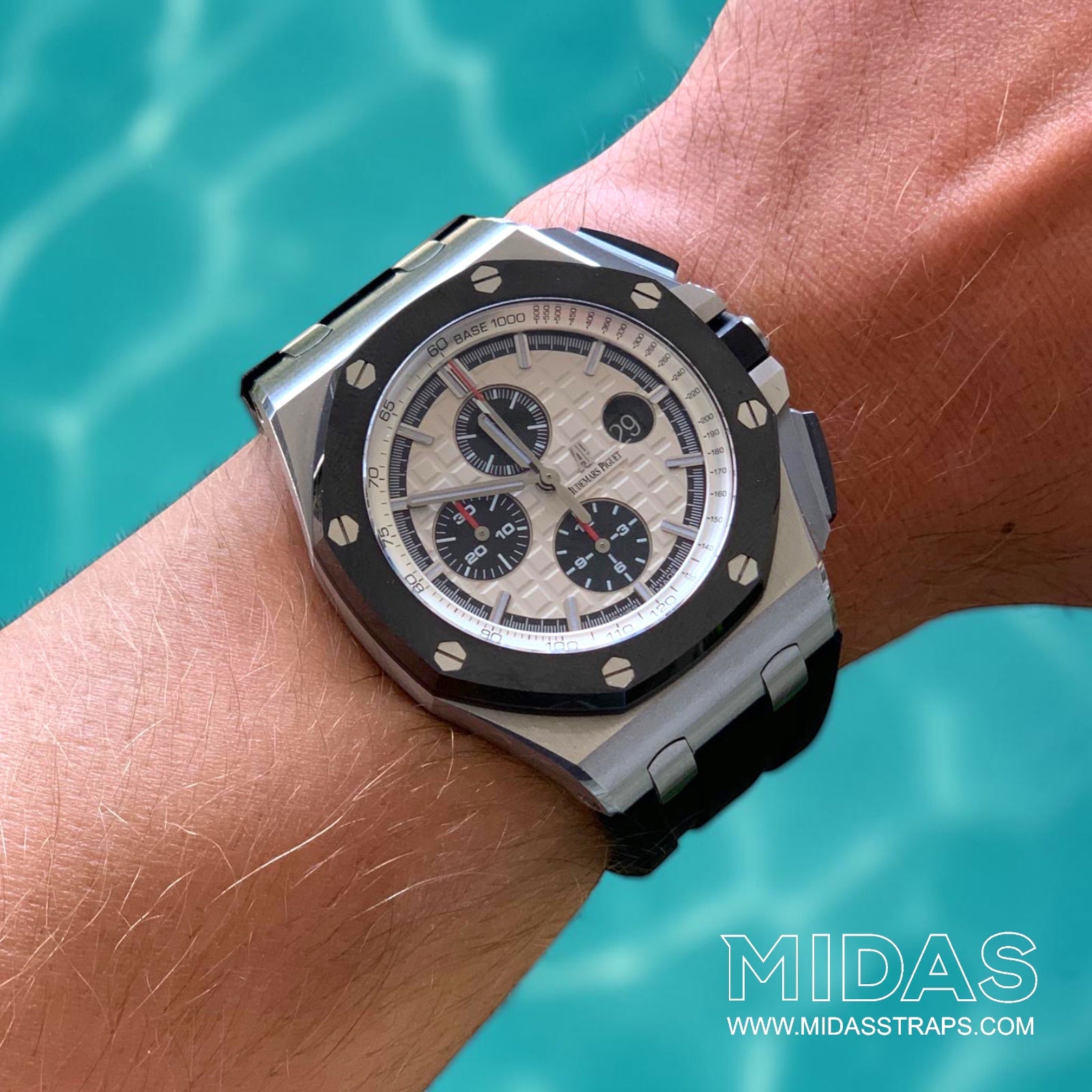 Rear wrist view of a black OEM replacement rubber strap fitted to an Audemars Piguet Royal Oak Offshore watch.