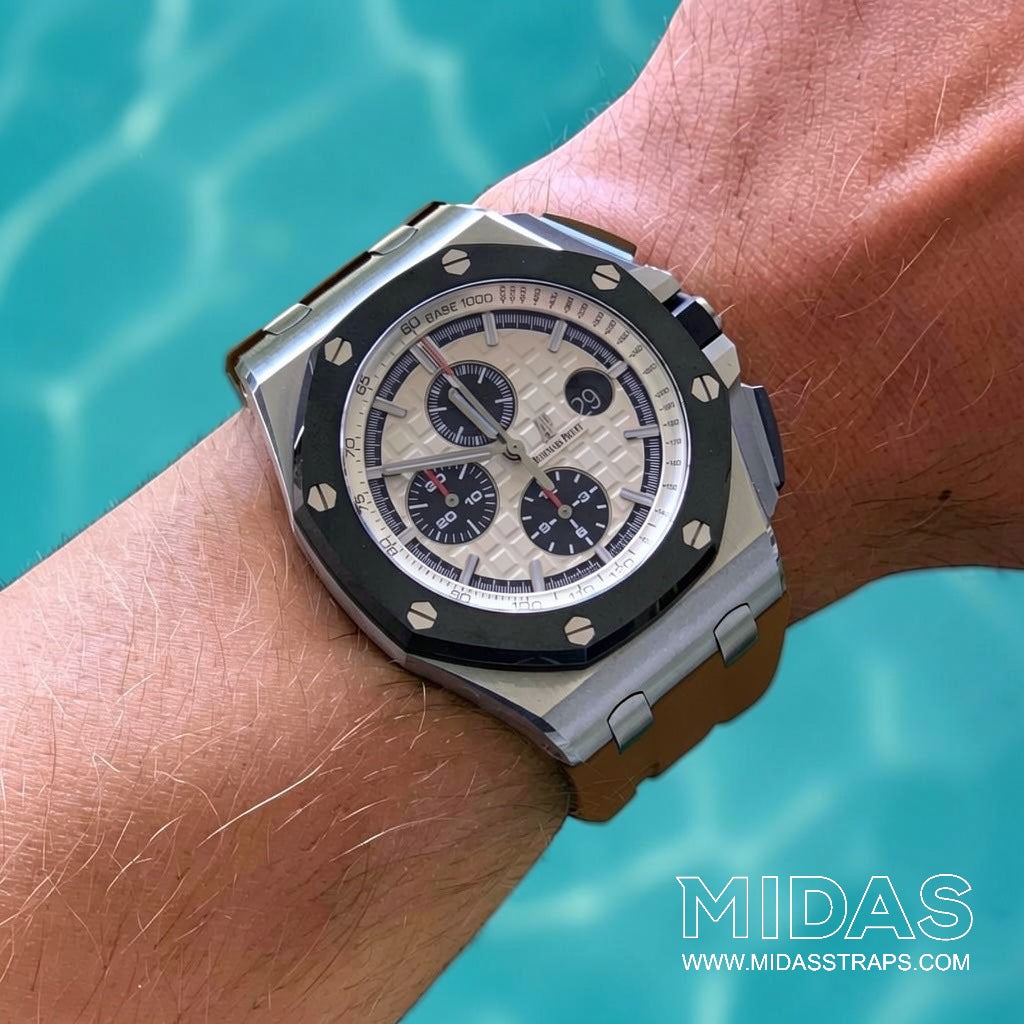 Brown rubber replacement strap by MIDAS Straps fitted to an Audemars Piguet Royal Oak Offshore 44mm watch in a lifestyle wrist photograph.