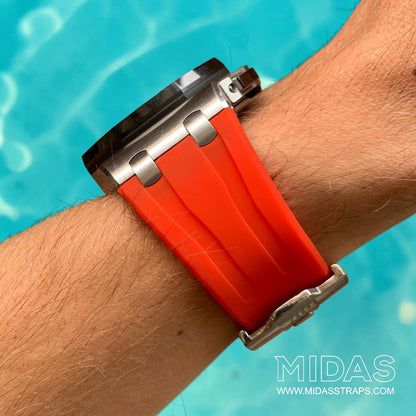 Side profile of a red replacement rubber strap fitted to an AP Royal Oak Offshore 26400 on wrist.