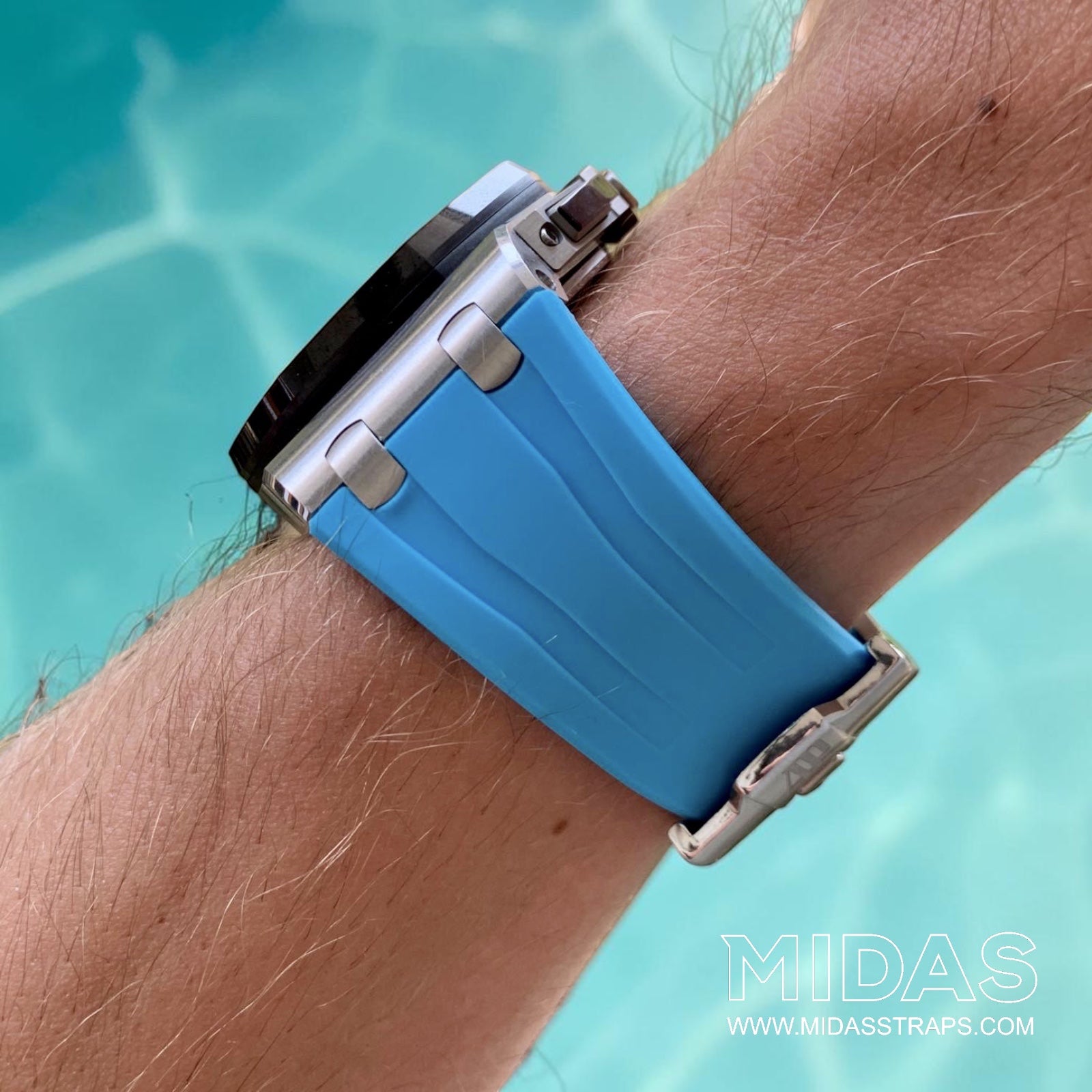 Side profile of a light blue replacement rubber strap fitted to an AP Royal Oak Offshore 26400 on wrist.