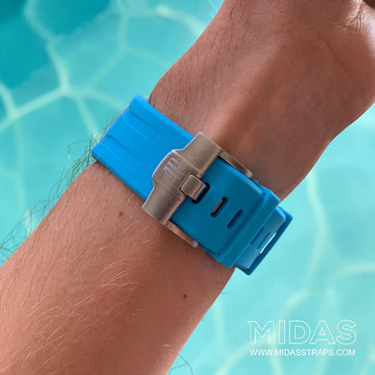 Rear wrist view of a light blue replacement rubber strap fitted to an AP Royal Oak Offshore 26400.