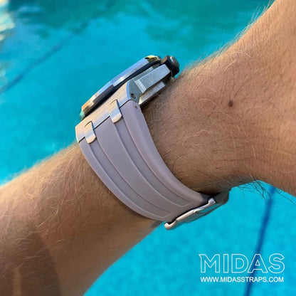 AP Royal Oak Offshore 42mm blush grey rubber replacement strap worn on wrist poolside MIDAS