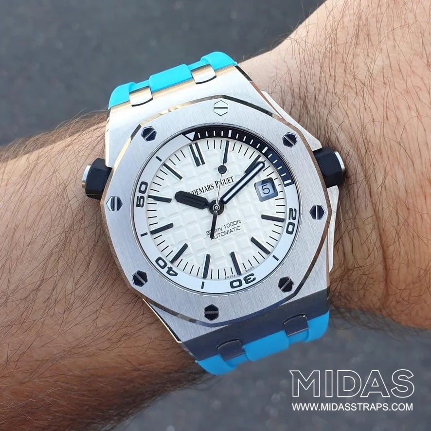 AP Royal Oak Offshore 42mm blue rubber replacement strap worn on wrist poolside MIDAS