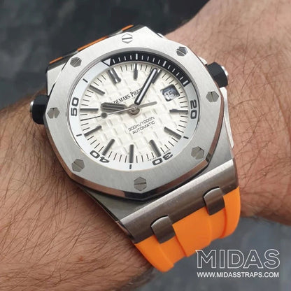 AP Royal Oak Offshore 42mm orange rubber replacement strap worn on wrist poolside MIDAS